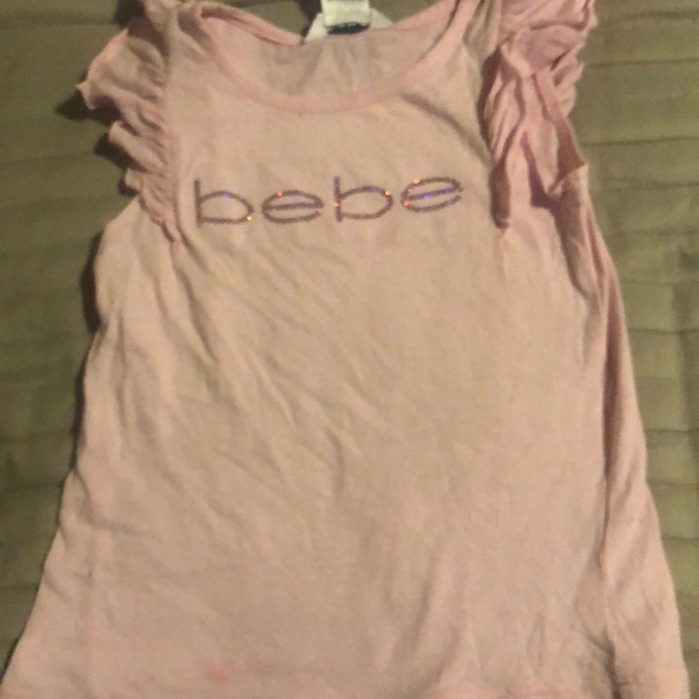 Light pink Bebe  shirt with pink Bebe writing